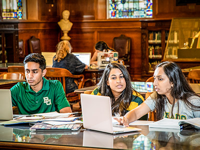 Students studying in Armstrong Browning Library